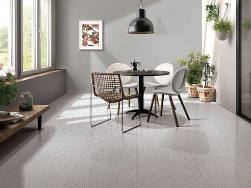 Light grey speckled inorganic terrazzo flooring for living and dining room, large‑area interior floor application